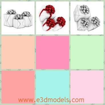 3d model of Christmas gifts - This is a 3d model which is about three Christmas gifts wrapped in white papers and tied by red ribbons.